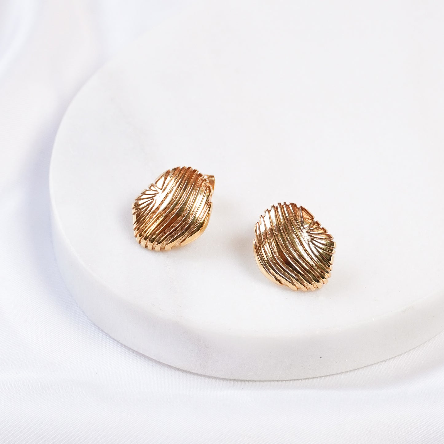 The Shell of Gold Studs